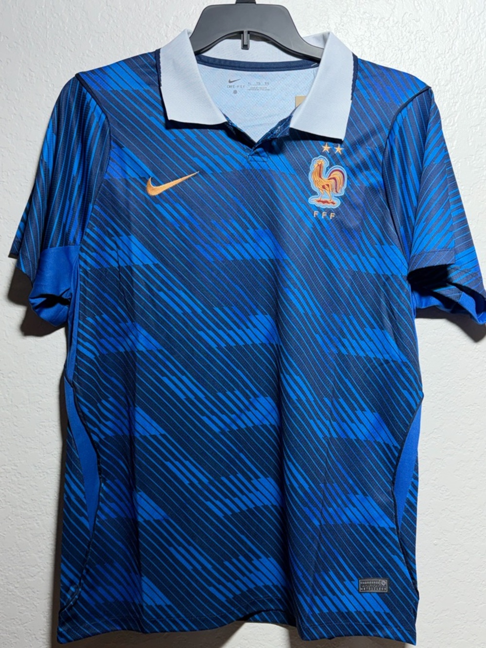 Nike Men’s Blue France 2026 Football Jersey with Gold Swoosh